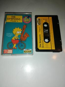 Die Simpsons Folge 4 Homer als Frauenheld/Der schöne Jaques Schwarz mit Gelben Aufkleber 847475-4 Karussell