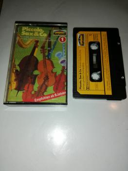 Piccolo. Sax & Co Folge 1 Kleine Geschichte eines grossen Orchesters Schwarz mit Gelben Aufkleber 824714-4 Karussell