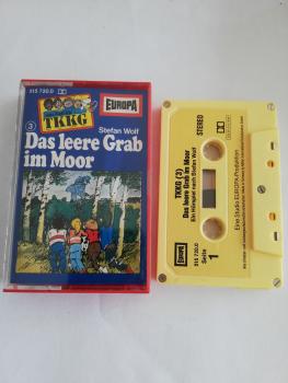 TKKG Folge 3 Das leere Grab 5-fach Silber geschraubt Gelb mit Gelbem Aufkleber im Moor 515720.0 Europa(Kleines Fenster, Namen im Logo voll ausgeschrieben)