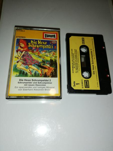 Die Hexe Schrumpeldei Folge 2 Schrumpeldei und Schrumpelmei mit neuen Hexereien Schwarz mit Gelben Aufkleber 515065.5(Weißes Frontcover)