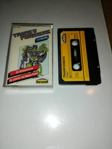 Transformers Folge 1 Die Weltraumbrücke/Die geheime Anti-Materie Formel Schwarz mit Gelben Aufkleber 839550-4