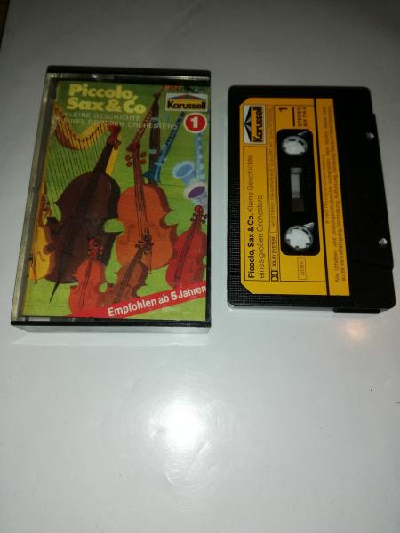 Piccolo. Sax & Co Folge 1 Kleine Geschichte eines grossen Orchesters Schwarz mit Gelben Aufkleber 824714-4 Karussell