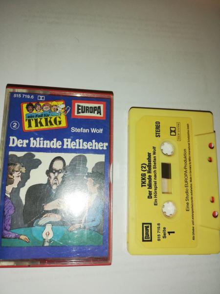 TKKG Folge 2 Der blinde Hellseher Gelb mit gelben Aufkleber 515719.6 Europa(Namen im Logo voll ausgeschrieben)