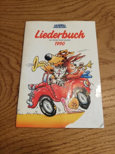 Spielen und Lernen 1990 Liederbuch(Abriss auf Vorderseite)