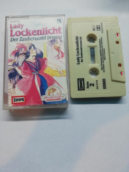 Lady Lockenlicht Folge 8 Der Zauberwald brennt Weiß mit Schwarzen Druck 514277.6 Europa Frontcover beschrieben