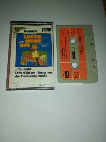 Lotta zieht um Neues aus der Krachmacherstrasse Grau mit Orangen Aufkleber 7172219 Fontana(MC Cover Seite 1 beschrieben)