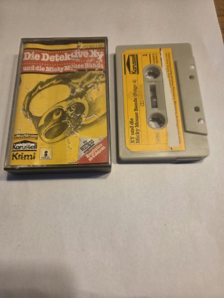 Die Detektive XY Folge 4 und die Mickey Mouse-Bande Schwarz mit Gelben Aufkleber 815904-4 Karussell(MC Label Seite 1 und Innencover beschädigt)