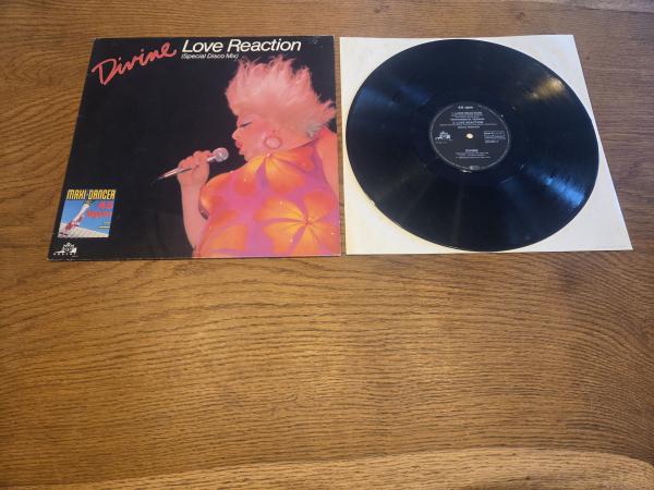 Divine ‎– Love Reaction (Special Disco Mix) 1983  Metronome ‎– 813 821-1, Bobcat Records ‎– 813 821-1 12", Maxi-Single, 45 RPM Deutsche Pressung VG+/VG+