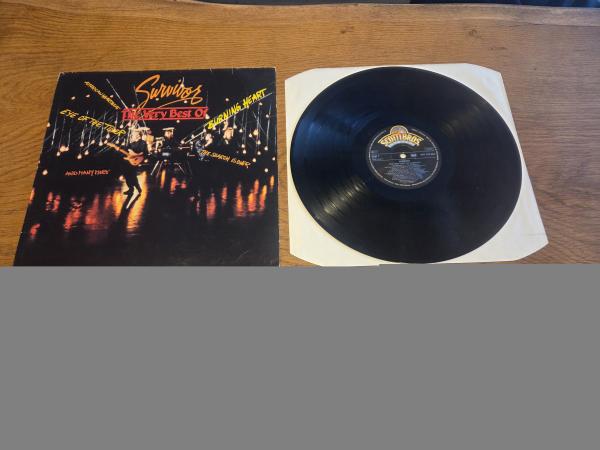 Survivor – The Very Best Of 1986 Scotti Bros. Records INT 147322 Deutsche Pressung VG+/VG+
