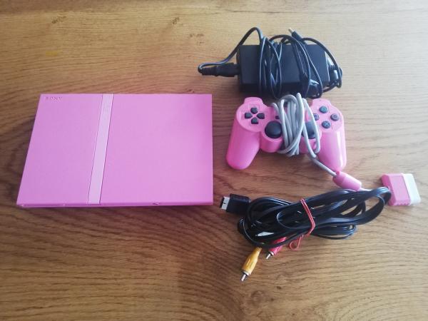 Playstation 2 Slim Rosa mit einem Rosa Controller und kompletten Kabel