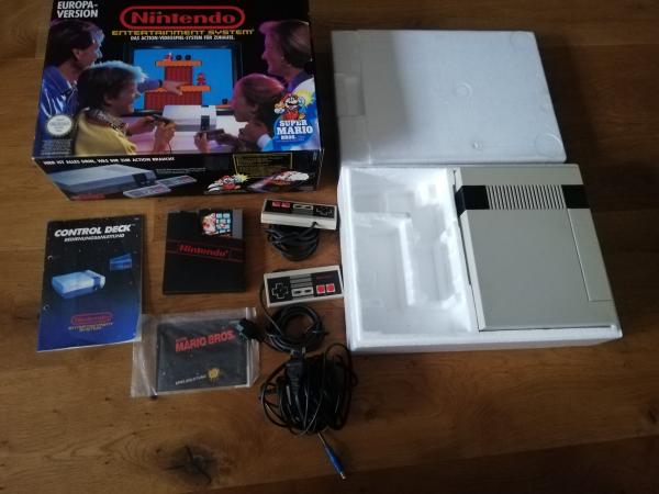 Nintendo NES Europa-Version komplett mit Spiel, Kabeln, 2 Controller, Anleitung und Originalverpackung mit Styropor